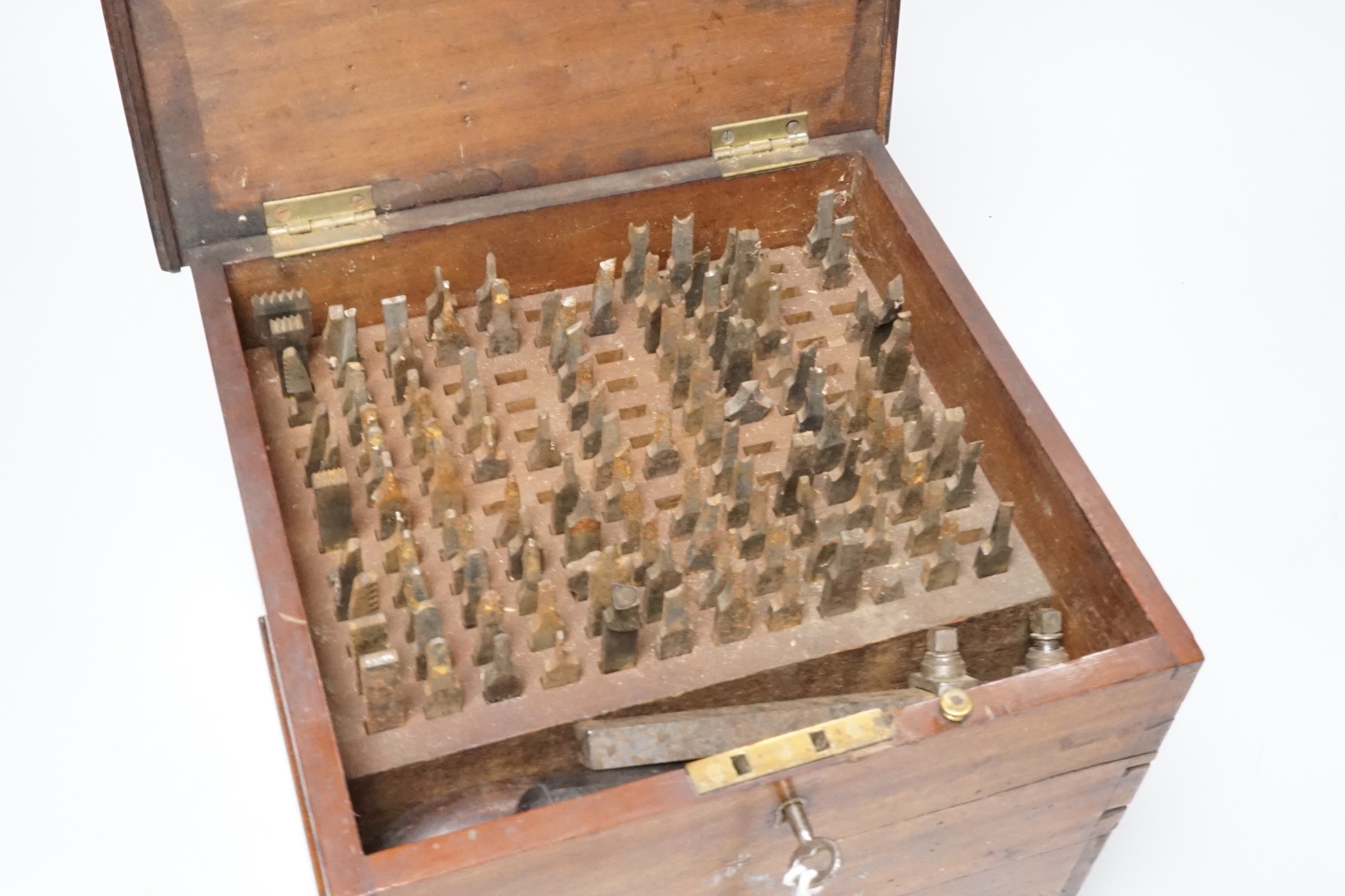 A 19th century cased machine tooling set, 23cm wide, 21cm high